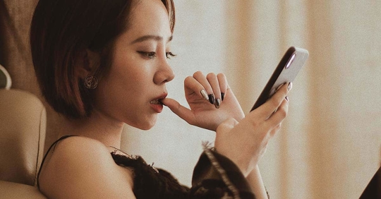 woman using her phone