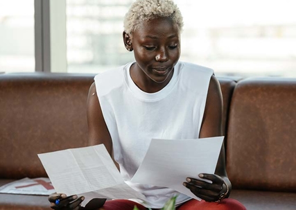A woman reading papers